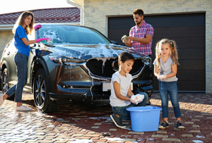 Family Washing Car
